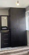 Dark Brown Eucalyptus fitted wardrobe and drawers with a matching wall mirror, fitted in middlesbrough